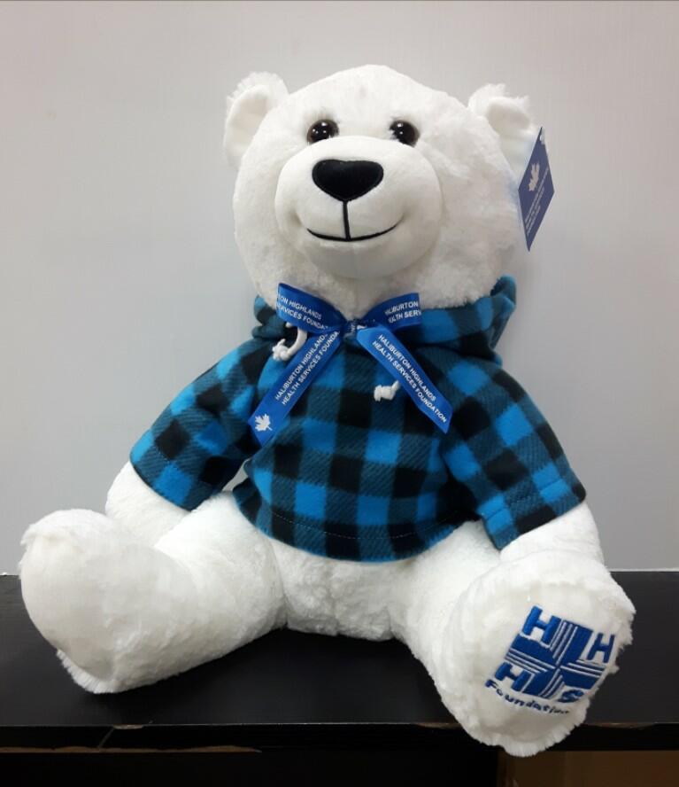 Orson in a blue plaid jacket