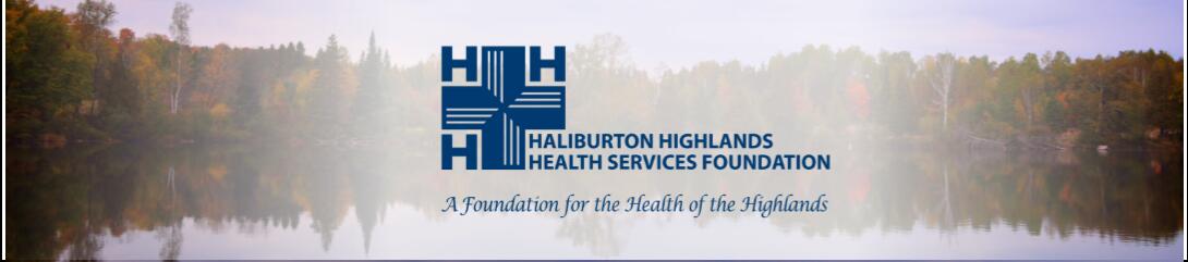 Landscape of trees in fall colours reflecting on a still lake with HHHS Foundation logo over top
