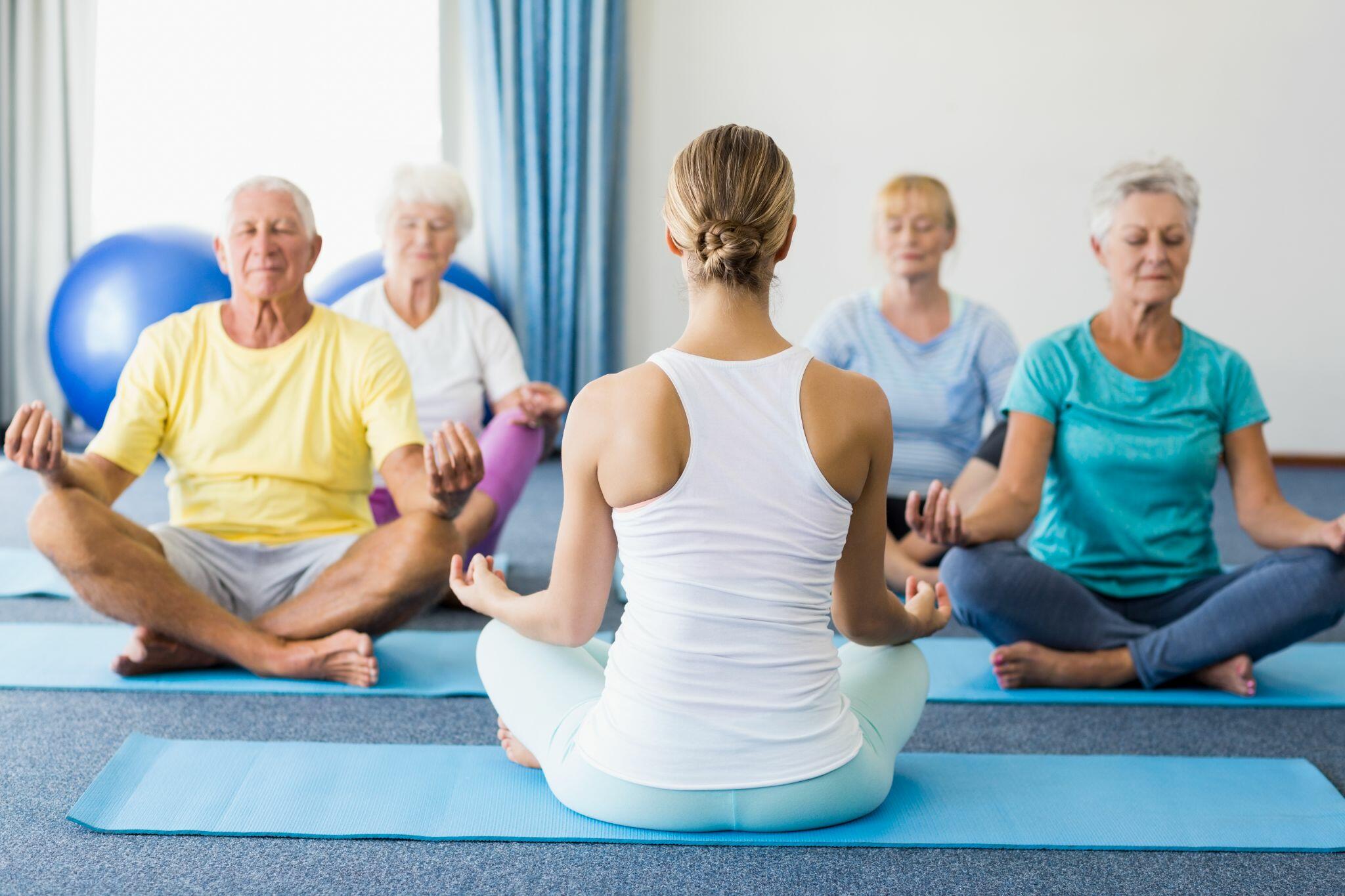 Yoga Instructor With Senior Citizen Class