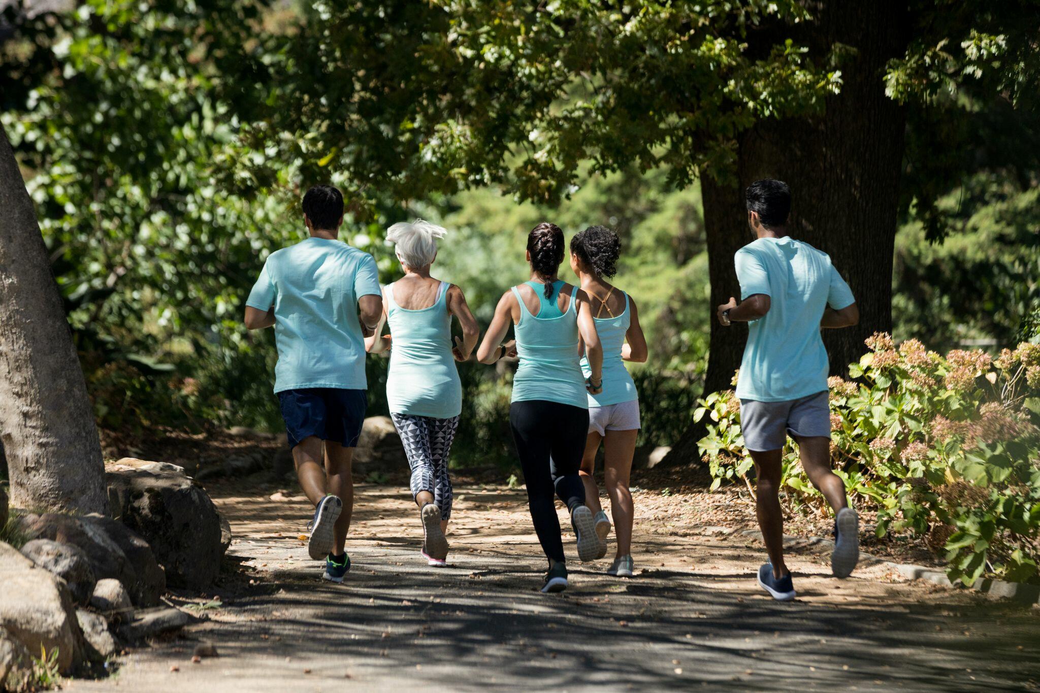 Group of Marathoners Jogging in the Park