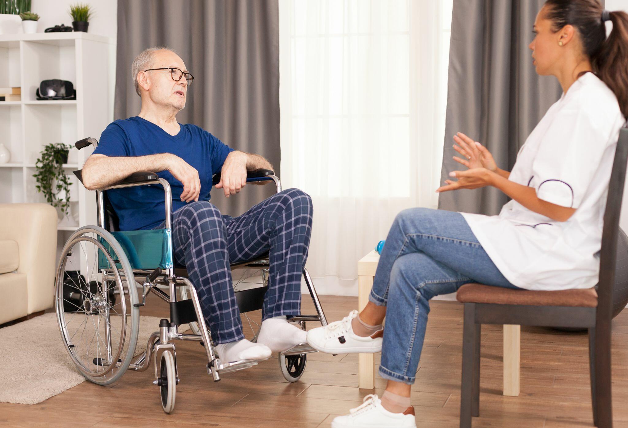 Medical Worker Explaining the Treatment to Elderly Patient