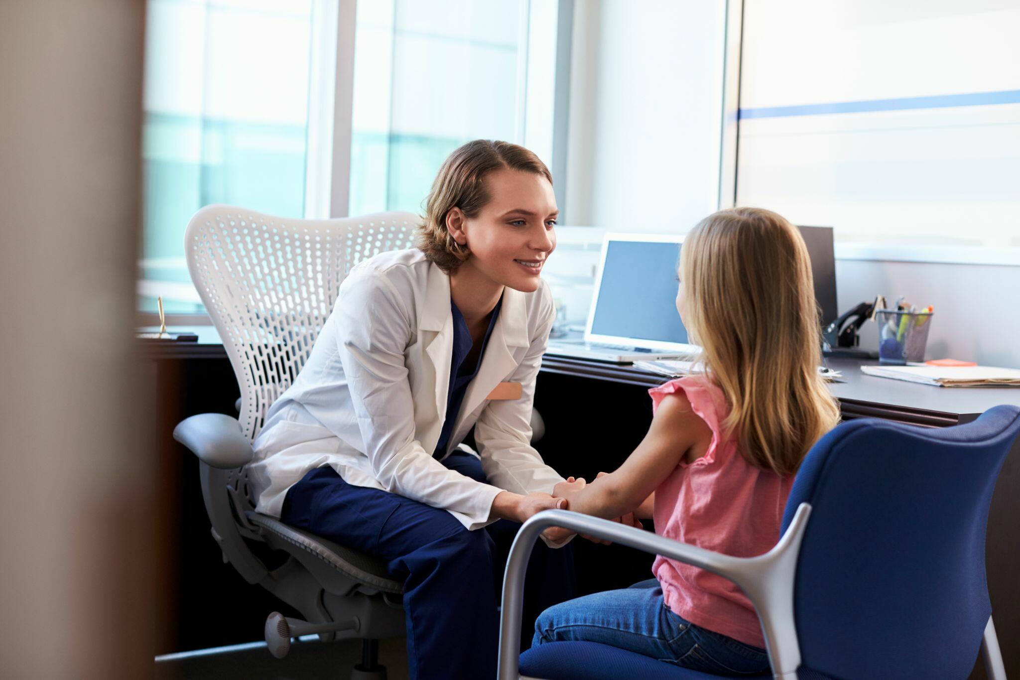 Pediatrician Talking to Female Child in Hospital 2