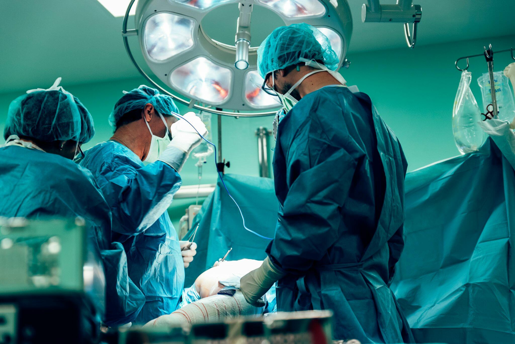 Team of Surgeons Operating in the Hospital