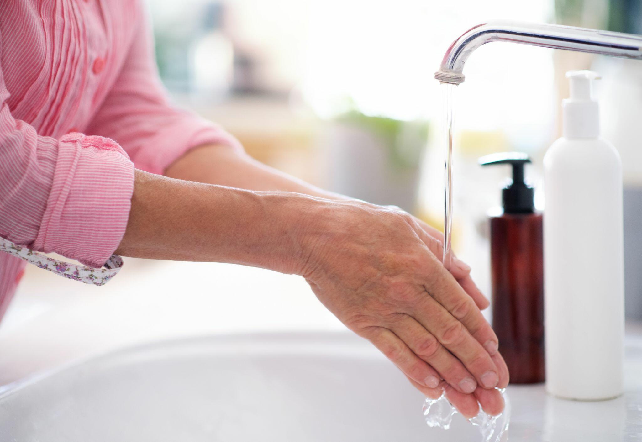 Women Washing hands at Home
