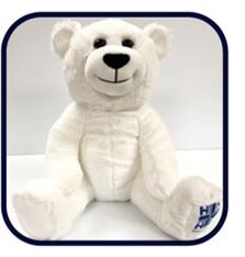 puzzle with bears on it and white teddy bear sitting